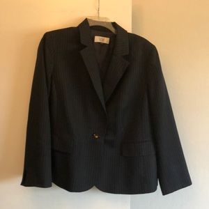 Black suit with light blue pinstripes